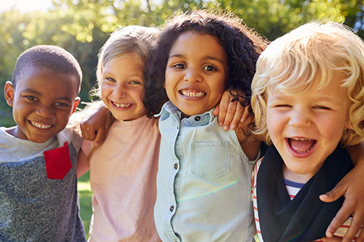 a group of children smiling